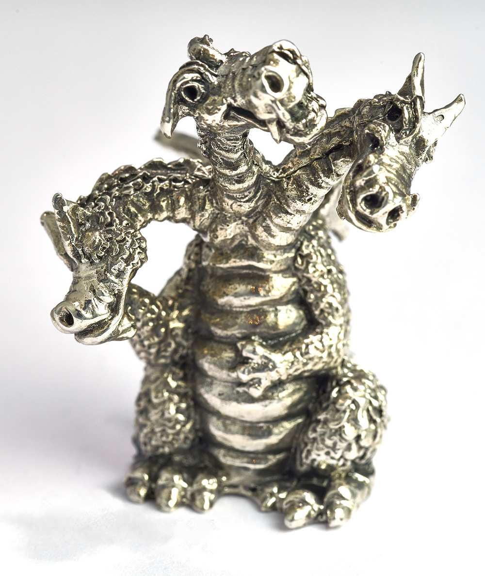 серебряная статуэтка дракон